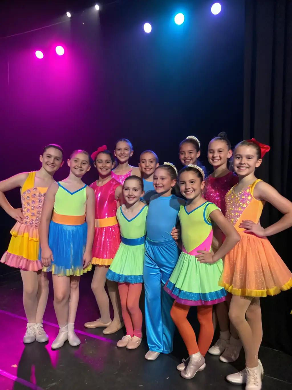 A heartwarming image of children participating in a theater workshop, their faces lit up with excitement and imagination, highlighting the impact of LA COMPAGNIE DE L AUBE's programs on young people.